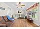 Inviting living room featuring hardwood floors, neutral paint, and natural light at 300 Scotland Dr, Kings Mountain, NC 28086