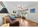 Bright living room featuring hardwood floors, neutral paint, and large windows at 300 Scotland Dr, Kings Mountain, NC 28086