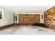 The covered patio features a brick accent wall and a concrete floor at 300 Scotland Dr, Kings Mountain, NC 28086