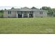 A lovely ranch style home with front porch seating situated on a well-maintained green lawn at 3100 Wallace Rd, Midland, NC 28107
