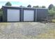 Detached garage with multiple bays and gravel driveway at 3100 Wallace Rd, Midland, NC 28107