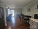 Open kitchen with modern appliances flows into the dining and living areas at 3100 Wallace Rd, Midland, NC 28107