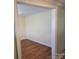 An open, airy room with hardwood floors and clean lines, ready for customization at 3100 Wallace Rd, Midland, NC 28107