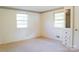 Bright bedroom with built-in storage and two windows with natural light at 3119 6Th Sw Ave, Hickory, NC 28602