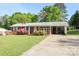 Single-story brick home boasting a covered carport and mature trees at 3119 6Th Sw Ave, Hickory, NC 28602
