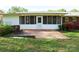Back patio and enclosed porch area in a shady yard; perfect for outdoor living at 3119 6Th Sw Ave, Hickory, NC 28602