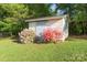Small outdoor shed with blooming bushes nearby at 3119 6Th Sw Ave, Hickory, NC 28602