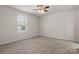 Bright bedroom with carpet floors and a ceiling fan at 3315 15Th Sw Ave, Hickory, NC 28602