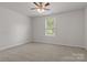 Bright bedroom with carpet floors and a ceiling fan at 3315 15Th Sw Ave, Hickory, NC 28602