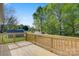 Deck view of large backyard featuring a treeline, and ample space for activities and relaxation at 3315 15Th Sw Ave, Hickory, NC 28602