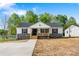 Charming single-story home featuring a welcoming porch and a well-manicured front yard at 3315 15Th Sw Ave, Hickory, NC 28602