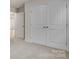 Hallway featuring natural light and a double door closet at 3315 15Th Sw Ave, Hickory, NC 28602