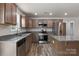 Modern kitchen features stainless steel appliances, gray cabinets, granite countertops, and a kitchen island at 3315 15Th Sw Ave, Hickory, NC 28602