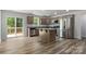 Modern kitchen boasts stainless steel appliances and a central island, perfect for cooking at 3315 15Th Sw Ave, Hickory, NC 28602