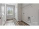 Well-lit laundry room with window and shelving at 3315 15Th Sw Ave, Hickory, NC 28602