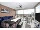 Bright bedroom featuring a large window, comfortable bed, and city views at 333 W Trade St # 800, Charlotte, NC 28202