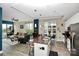 Open concept living space with modern kitchen and comfortable seating area at 333 W Trade St # 800, Charlotte, NC 28202