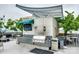 The grilling area is equipped with a stainless steel grill, prep area, and is conveniently shaded at 333 W Trade St # 800, Charlotte, NC 28202