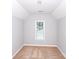 Cozy bedroom with neutral paint, plush carpet, and natural light through a window at 3546 Weddington Oaks Dr, Weddington, NC 28104