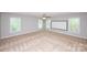 Spacious bedroom with three windows and a ceiling fan provides ample natural light at 3546 Weddington Oaks Dr, Weddington, NC 28104