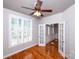 Bright office with hardwood floors, natural light, shuttered window, and French doors, perfect for a home office at 3546 Weddington Oaks Dr, Weddington, NC 28104