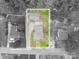 Aerial view showcasing the property with approximate lot lines at 400 Houser St, Cherryville, NC 28021