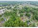 Aerial view of the neighborhood with the house marked by a red arrow at 400 Houser St, Cherryville, NC 28021