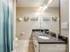 Bathroom with double sinks, a large mirror, and neutral decor at 4704 Amberside Dr, Rock Hill, SC 29732