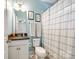 Fresh, tidy bathroom with attractive black and white art hanging above the toilet at 4704 Amberside Dr, Rock Hill, SC 29732