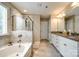 Large primary bathroom with soaking tub, shower and double sink vanity at 4704 Amberside Dr, Rock Hill, SC 29732