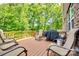 Spacious outdoor deck with patio seating and a grill, great for entertaining at 4704 Amberside Dr, Rock Hill, SC 29732