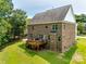 Aerial view of brick house with deck and large backyard at 4704 Amberside Dr, Rock Hill, SC 29732