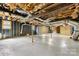 Unfinished basement provides ample space with exposed ceiling, concrete floors, and visible utilities, waiting for your personal touch at 4815 Rifle Range Rd, Conover, NC 28613