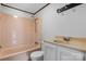 Bathroom features a shower and bathtub combination, toilet, and a single sink at 4815 Rifle Range Rd, Conover, NC 28613