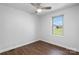 Neutral bedroom with a window offering an outside view at 4815 Rifle Range Rd, Conover, NC 28613