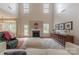 Spacious living room featuring a fireplace, hardwood floors, and a seamless connection to the outdoors at 5707 Parkstone Dr, Matthews, NC 28104