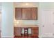 Dedicated office space featuring cabinets and a built-in desk area at 5707 Parkstone Dr, Matthews, NC 28104