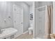Functional bathroom with a shower, toilet, sink, and neutral color palette at 5775 Monticello Nw Dr, Concord, NC 28027
