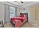Cozy bedroom with a queen-sized bed, soft lighting, and a serene atmosphere at 5775 Monticello Nw Dr, Concord, NC 28027