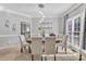 Stylish dining room with modern lighting, neutral walls, and ample seating at 5775 Monticello Nw Dr, Concord, NC 28027