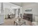 Bright dining room with large windows, elegant lighting, and a cozy piano at 5775 Monticello Nw Dr, Concord, NC 28027