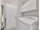 Convenient laundry room equipped with modern appliances and ample storage at 5775 Monticello Nw Dr, Concord, NC 28027