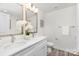 Bright bathroom featuring double vanity, modern fixtures, white marble countertops, and neutral decor at 601 Westway Dr, Gastonia, NC 28054