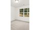 An empty bedroom showing a large window that lets in natural light at 601 Westway Dr, Gastonia, NC 28054
