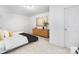 Bright bedroom featuring neutral decor, and an accent cabinet with decorative vase at 601 Westway Dr, Gastonia, NC 28054