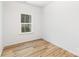 Cozy bedroom with hardwood floors and natural light from the window at 601 Westway Dr, Gastonia, NC 28054