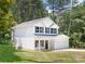 Charming two-story home boasts a classic design, manicured lawn, and an attached two-car garage at 601 Westway Dr, Gastonia, NC 28054