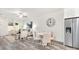 Open-concept living room with a dining area and a view of the kitchen, great for entertaining at 601 Westway Dr, Gastonia, NC 28054