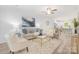 Inviting living room featuring stylish decor, a comfortable sofa, and lots of natural light at 601 Westway Dr, Gastonia, NC 28054