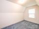 Bright bedroom with natural light and soft blue carpeting at 602 W 6Th St, Newton, NC 28658